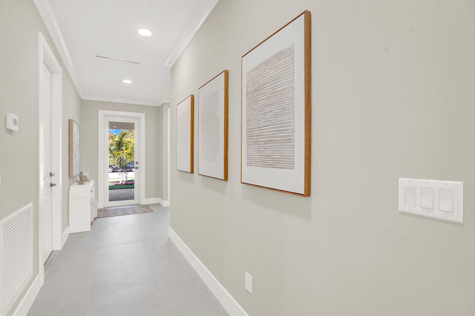18 Southwest 6th Street Delray Beach, FL 33444 - Photo 6 of 40 a view of a hallway with wooden floor and windows