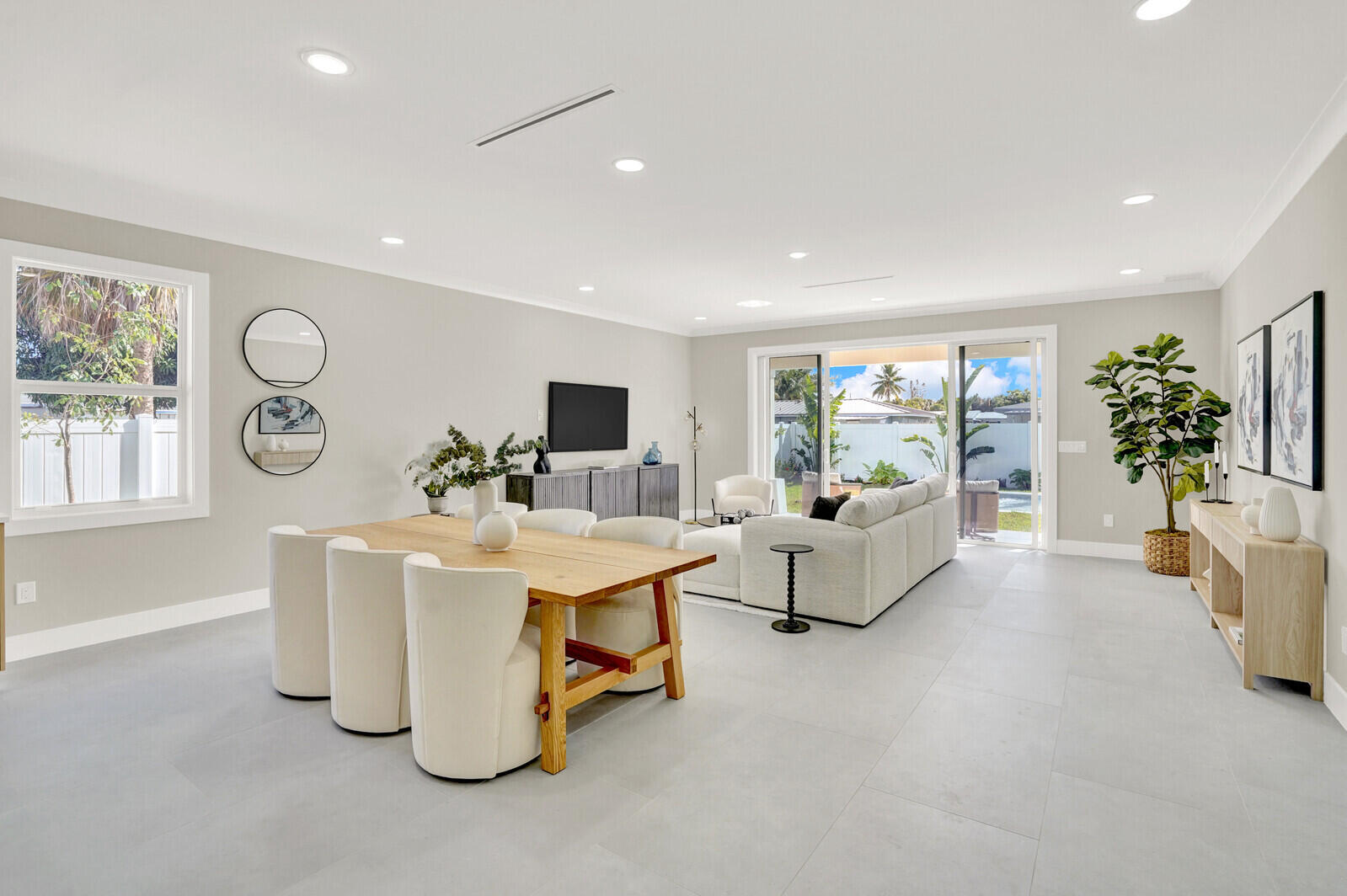 18 Southwest 6th Street Delray Beach, FL 33444 - Photo 9 of 40 a living room with furniture and a large window