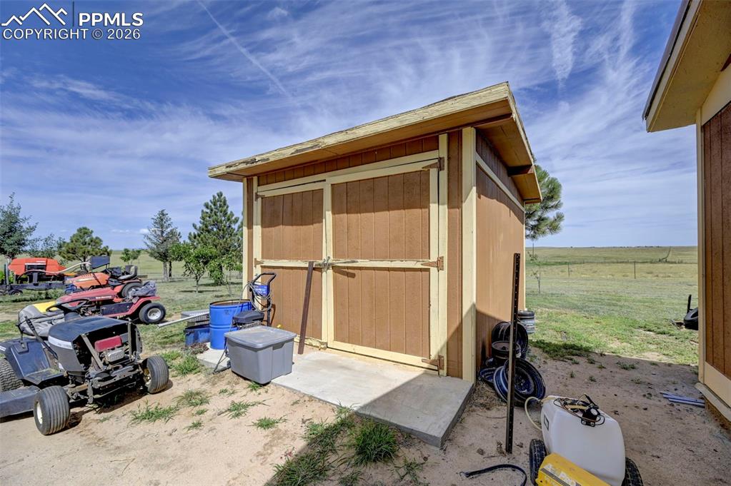 35875 Shear Road Yoder, CO 80864 - Photo 32 of 45 a house view with a backyard space