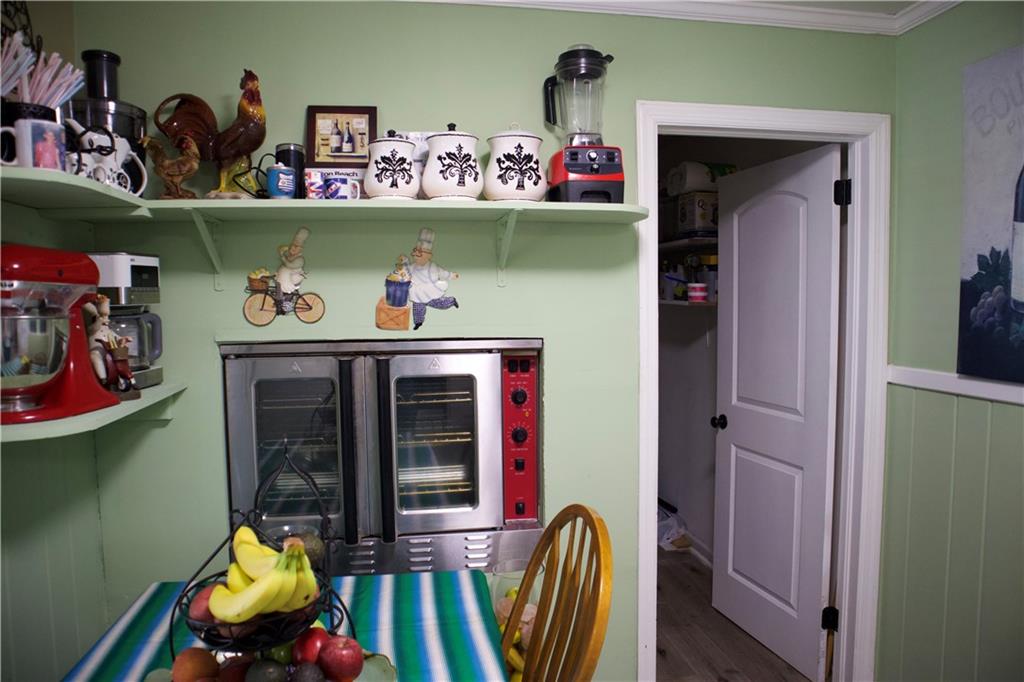 2586 Brandon Road Atlanta, GA 30337 - Photo 13 of 24 a room with lots of different colored cloths