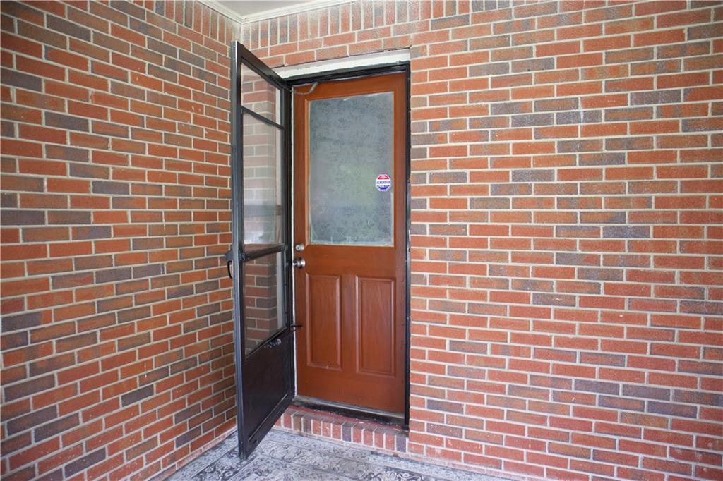 2586 Brandon Road Atlanta, GA 30337 - Photo 3 of 24 a brick building with a door