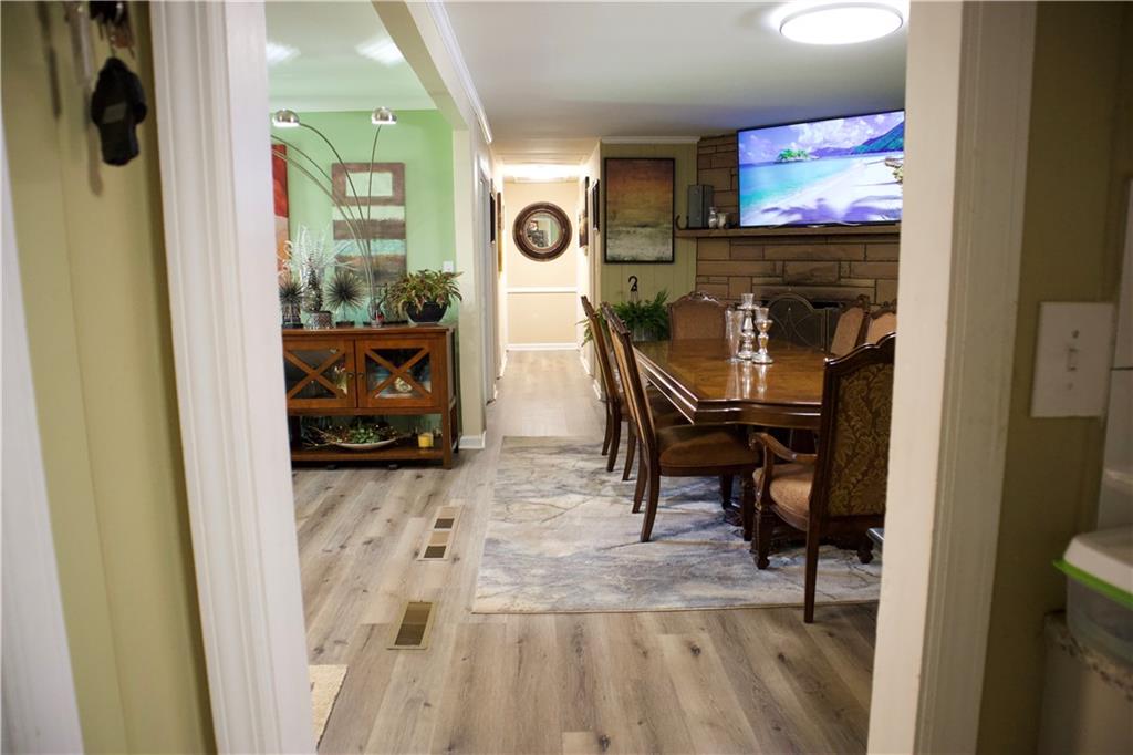 2586 Brandon Road Atlanta, GA 30337 - Photo 9 of 24 a living room with furniture and a flat screen tv