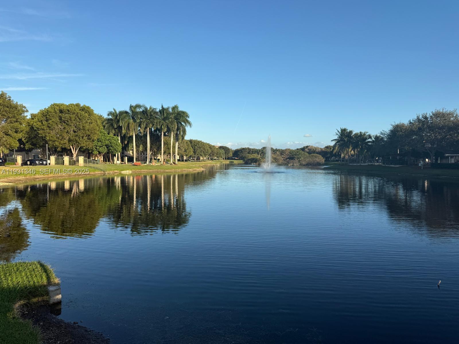 2494 Centergate Drive, Unit 201 Miramar, FL 33025 - Photo 17 of 20 a view of a lake with houses in outdoor space
