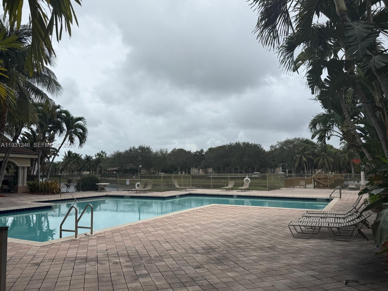 2494 Centergate Drive, Unit 201 Miramar, FL 33025 - Photo 20 of 20 a view of lake with outdoor space