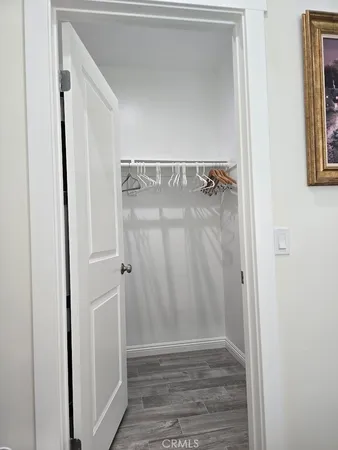 a view of walk in closet with window