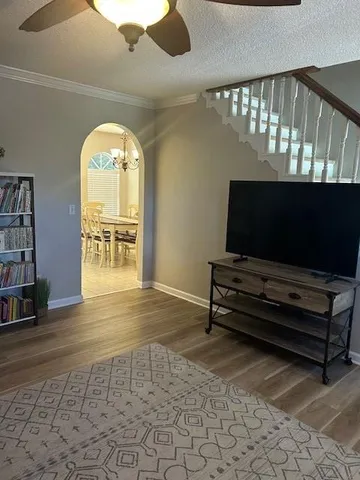 a view of hall way with furniture