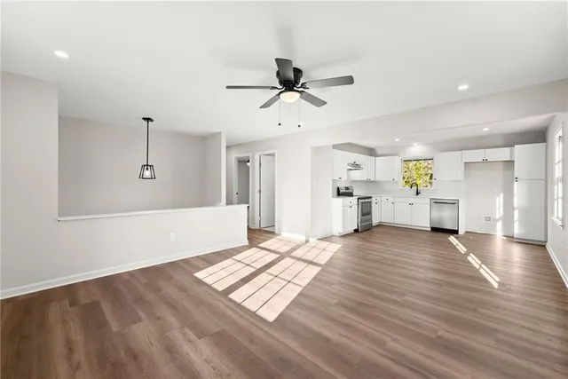 a view of an empty room and window