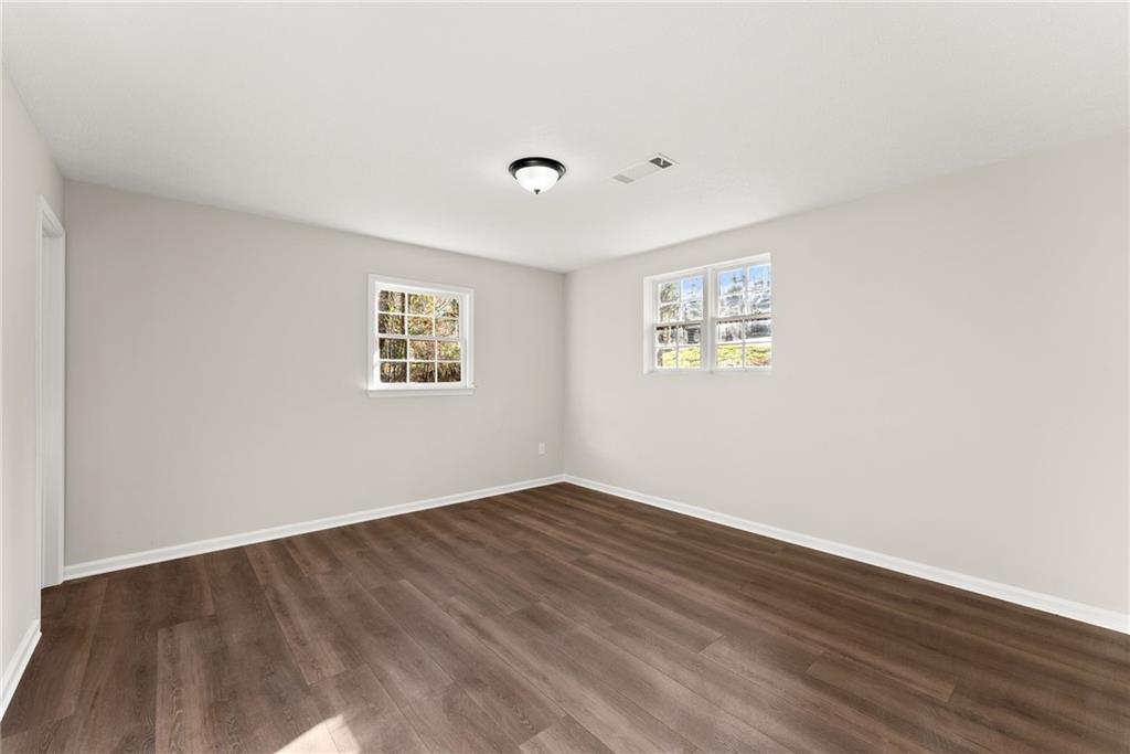 109 Tall Tree Road Athens, GA 30606 - Photo 25 of 33 an empty room with a window
