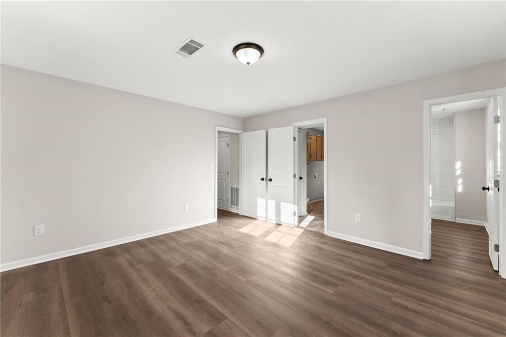 109 Tall Tree Road Athens, GA 30606 - Photo 26 of 33 a view of an empty room with wooden floor