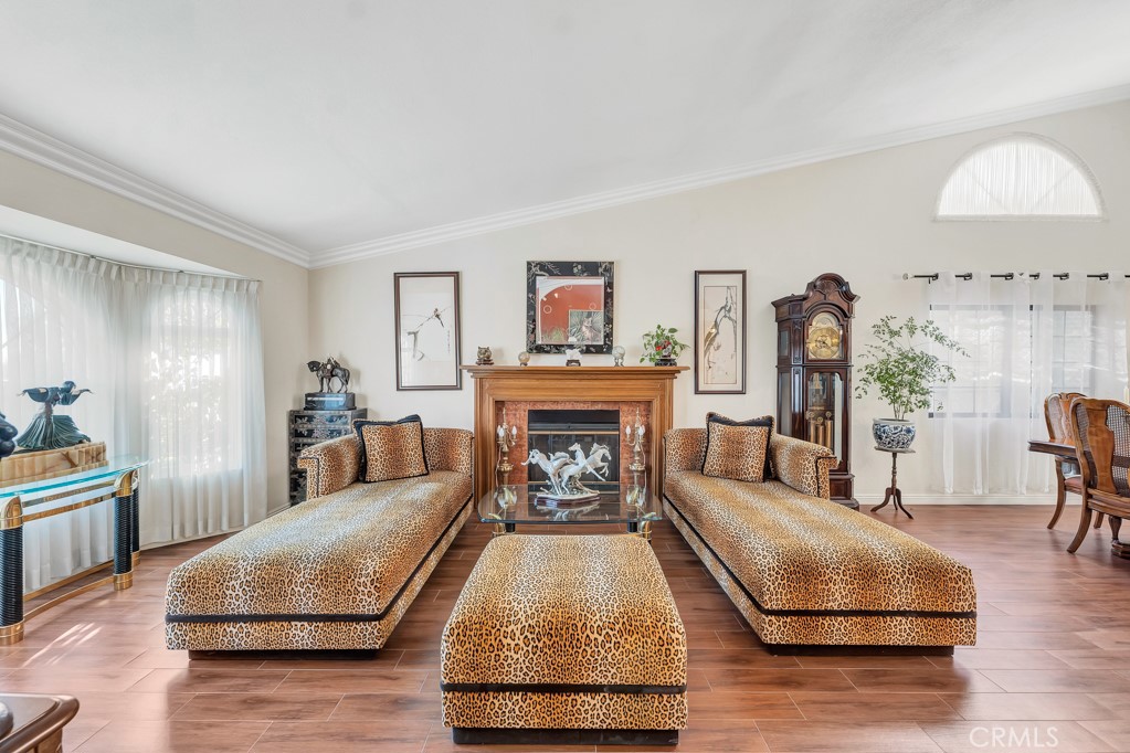 24338 Delta Drive Diamond Bar, CA 91765 - Photo 3 of 20 a living room with furniture and a fireplace