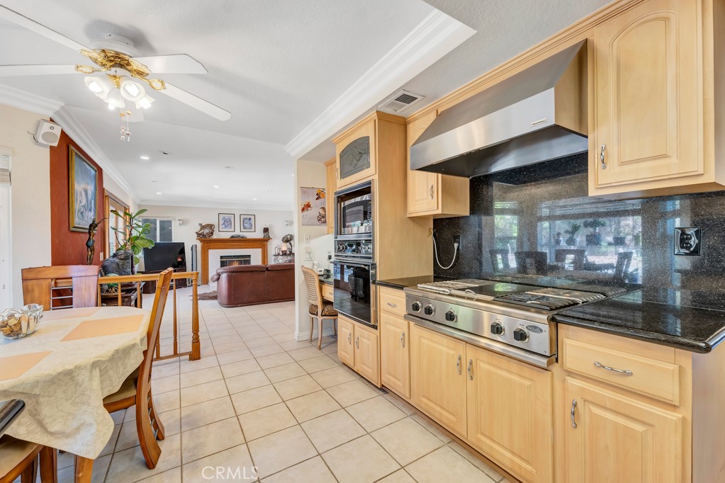 24338 Delta Drive Diamond Bar, CA 91765 - Photo 8 of 20 a kitchen with stainless steel appliances granite countertop a stove and a cabinets