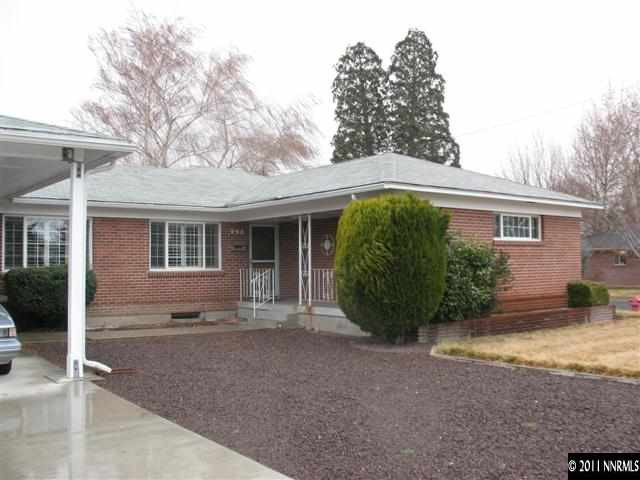 905 Robin Street Reno, NV 89509 - Photo 1 of 8 a view of a house with a backyard