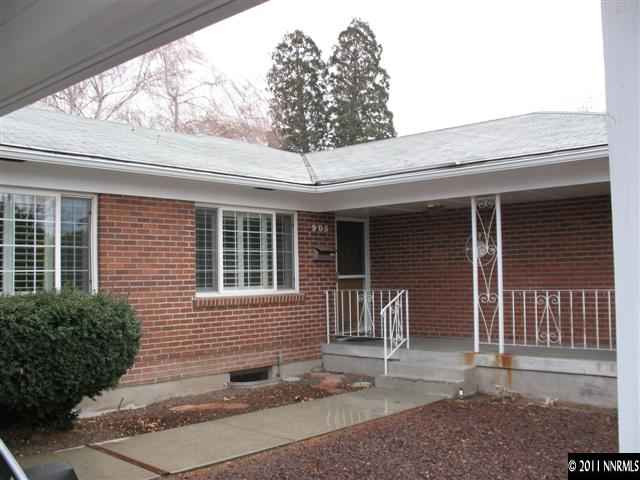 905 Robin Street Reno, NV 89509 - Photo 2 of 8 a front view of a house with patio