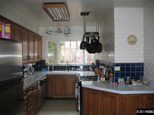 905 Robin Street Reno, NV 89509 - Photo 3 of 8 a kitchen with lots of counter top space