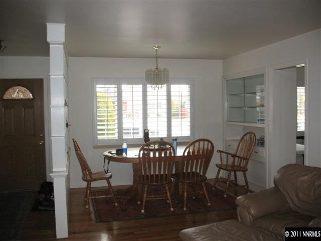 905 Robin Street Reno, NV 89509 - Photo 4 of 8 a view of a dining room with furniture window and outside view