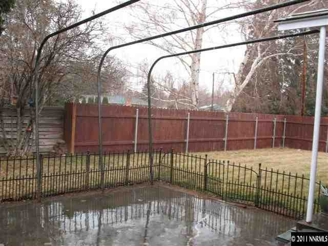 905 Robin Street Reno, NV 89509 - Photo 8 of 8 a view of a wrought iron fences in front of house