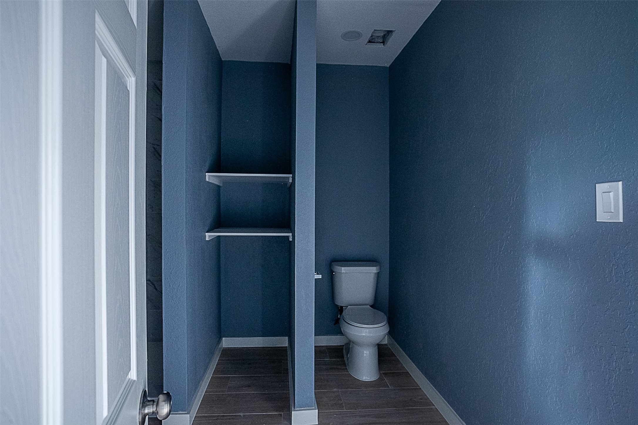 2630 Hazel Avenue Beaumont, TX 77702 - Photo 15 of 30 a white toilet sitting next to a shower