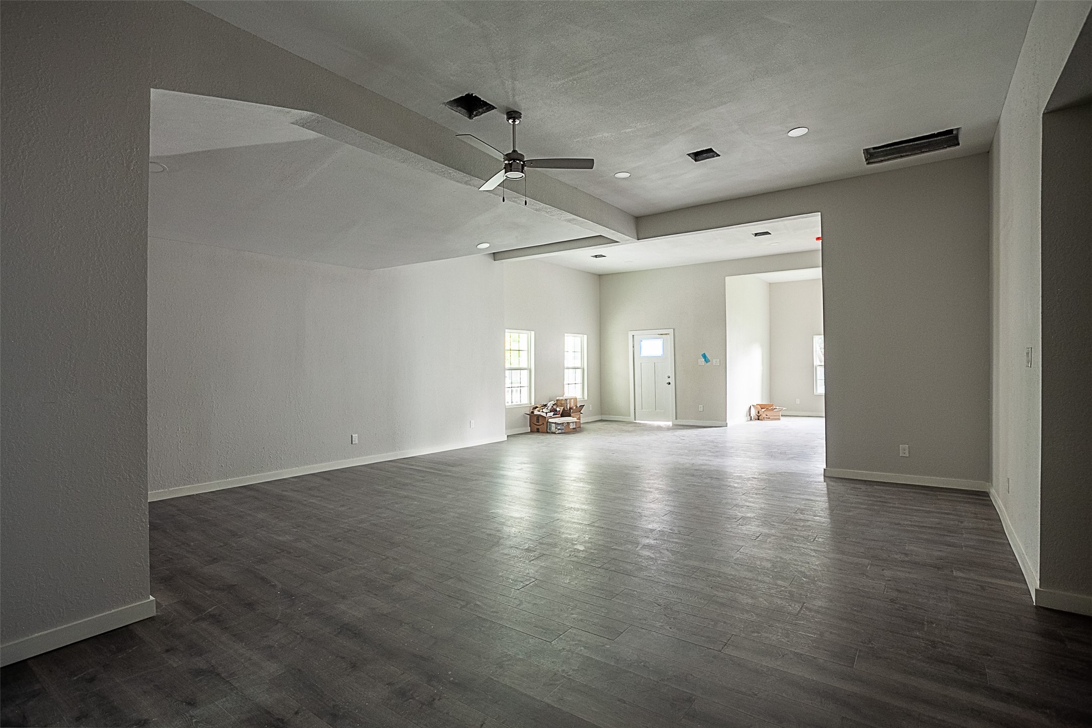 2630 Hazel Avenue Beaumont, TX 77702 - Photo 21 of 30 a view of empty room with wooden floor and fan