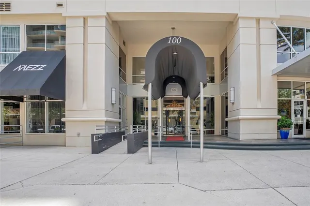 a view of a building with sitting area