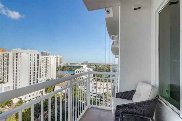 a view of swimming pool from a balcony