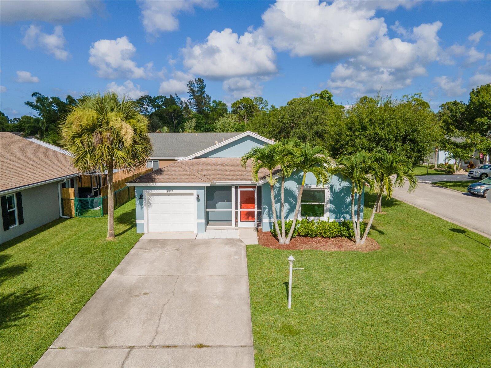 8917 Southwest Caprice Circle Stuart, FL 34997 - Photo 1 of 37 03-DJI_0924