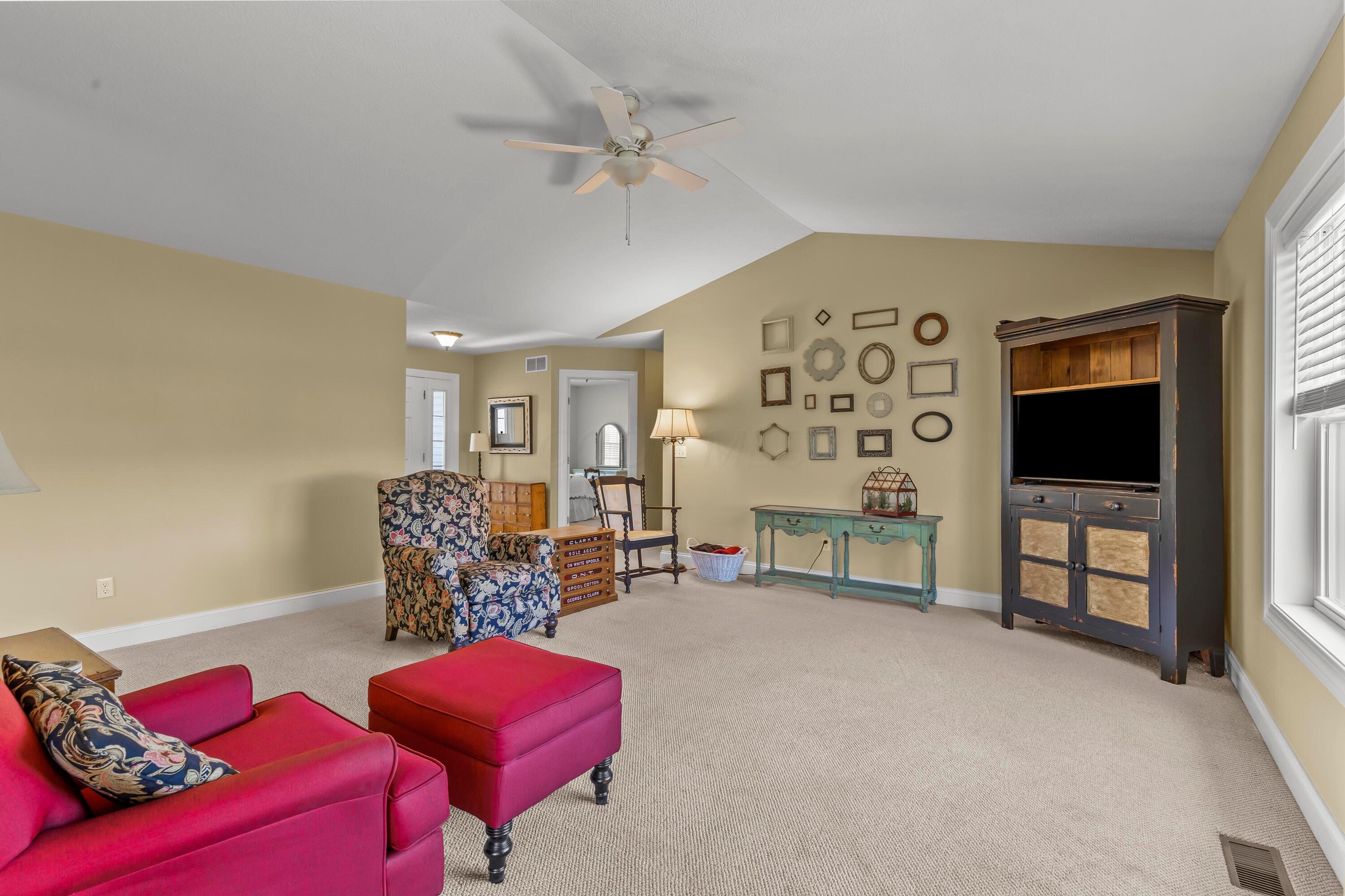 3582 Panhandle Road Delaware, OH 43015 - Photo 21 of 65 • Berber carpet • Tan painted walls • Lighted ceiling fan • Cathedral ceiling