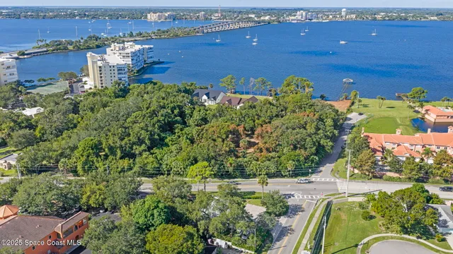 an aerial view of a houses with outdoor space
