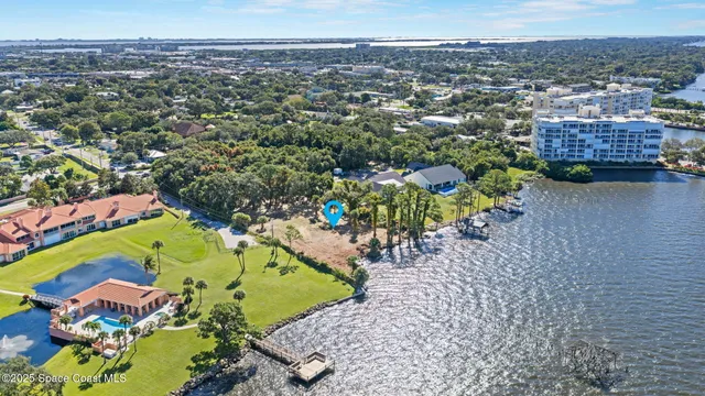 an aerial view of a house with a garden