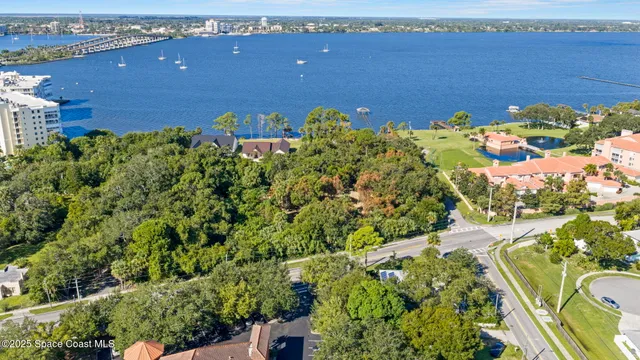 a view of a lake with a building in the background