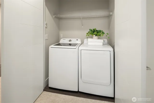 a utility room with dryer and washer
