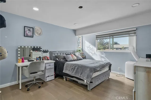 a bed room with a bed and a couch