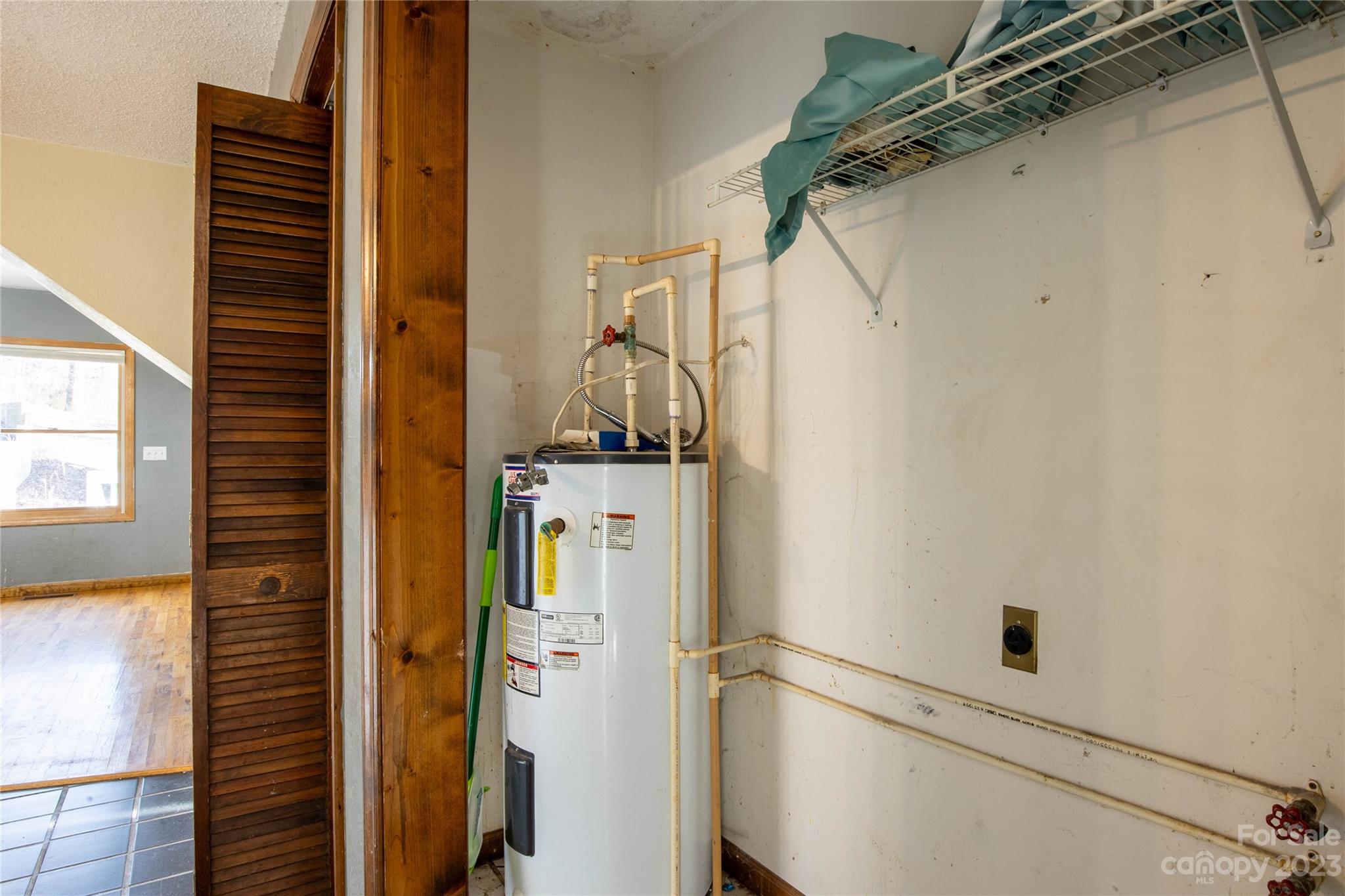 3954 Highway 80 Bakersville, NC 28705 - Photo 21 of 34 a view of storage and utility room