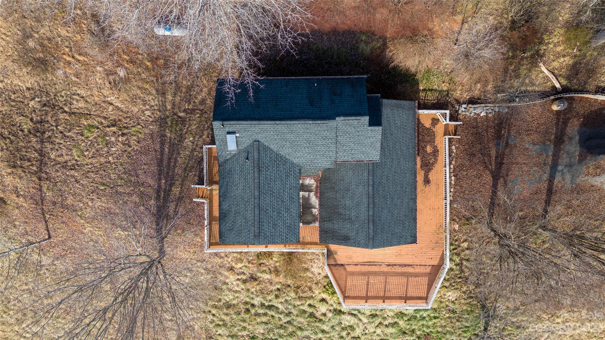 3954 Highway 80 Bakersville, NC 28705 - Photo 3 of 34 a backyard of a house with stairs