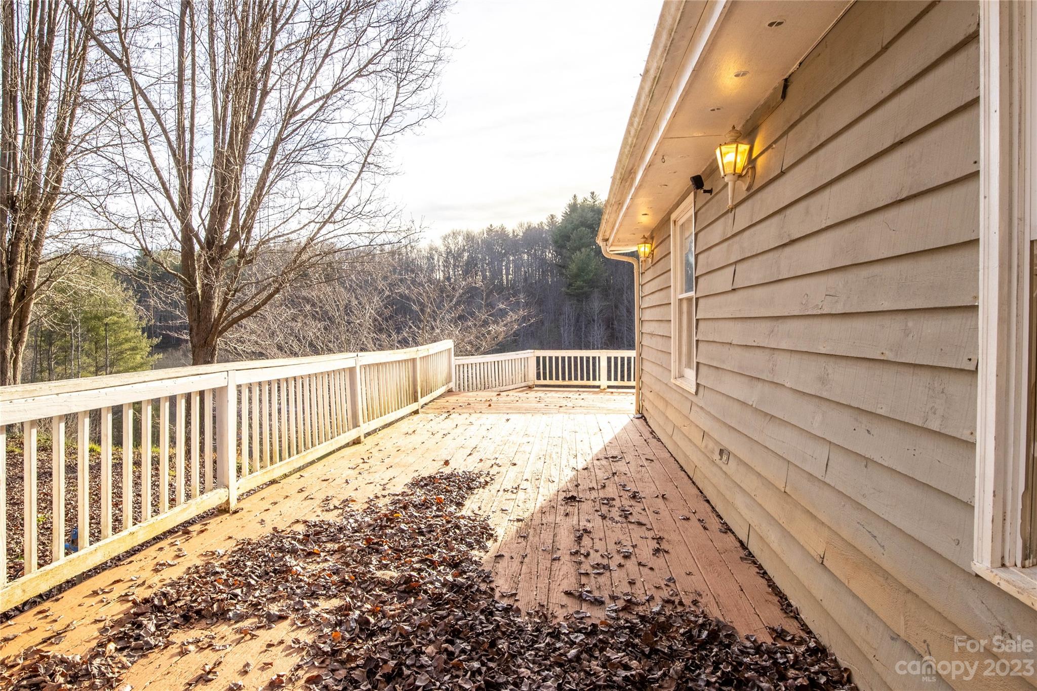 3954 Highway 80 Bakersville, NC 28705 - Photo 34 of 34 a view of balcony with wooden floor and fence