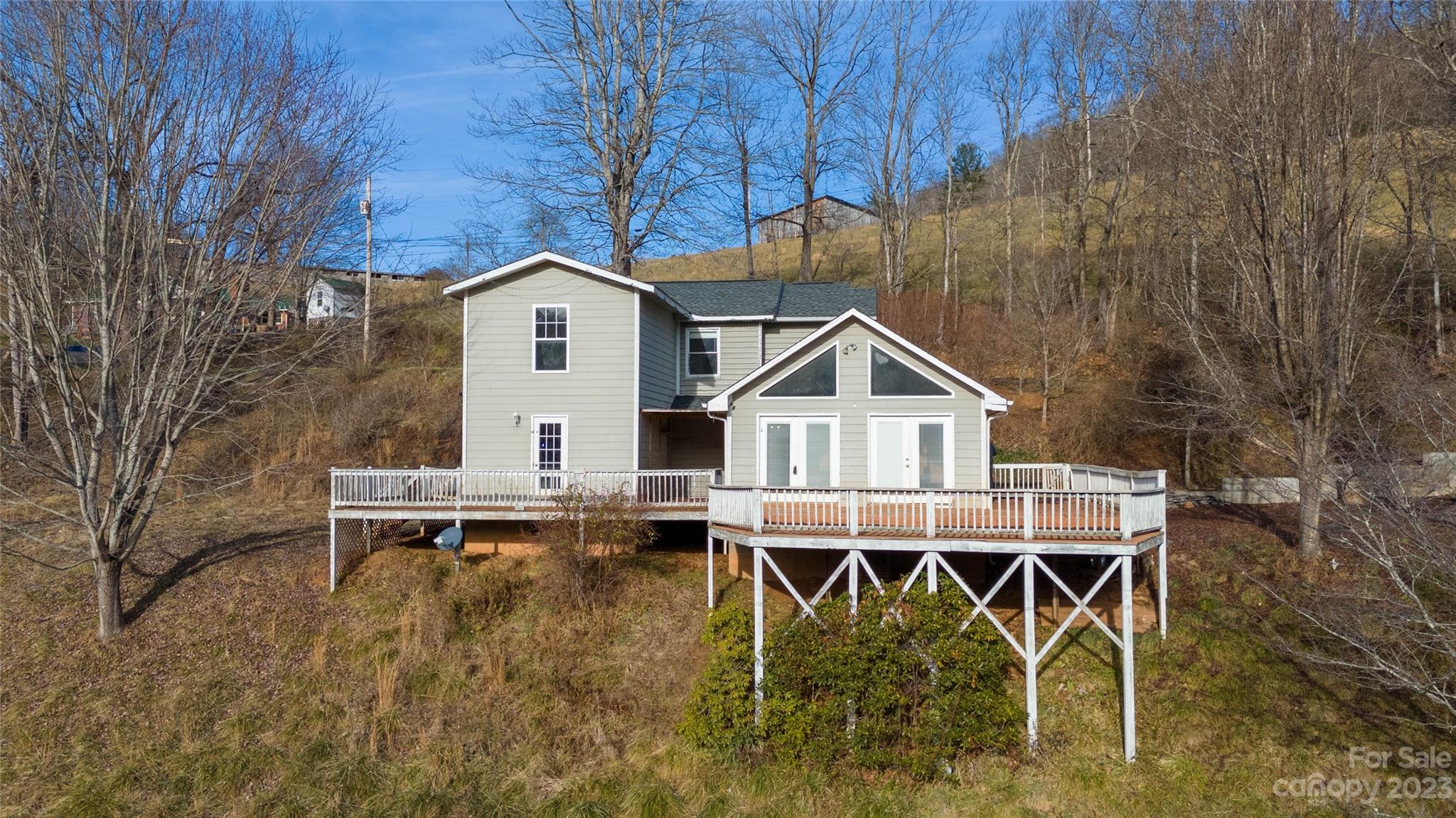 3954 Highway 80 Bakersville, NC 28705 - Photo 5 of 34 a view of a chairs and table in the terrace