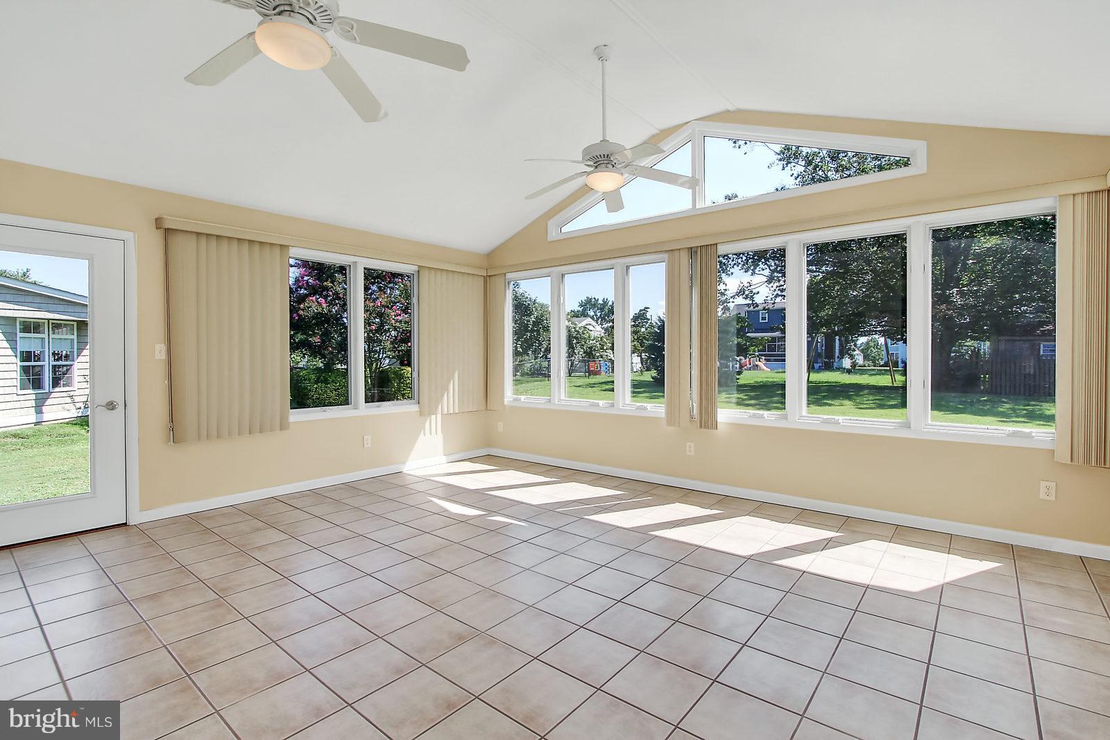 7846 North Cove Road Baltimore, MD 21219 - Photo 14 of 30 Plenty of Light in the Sunroom