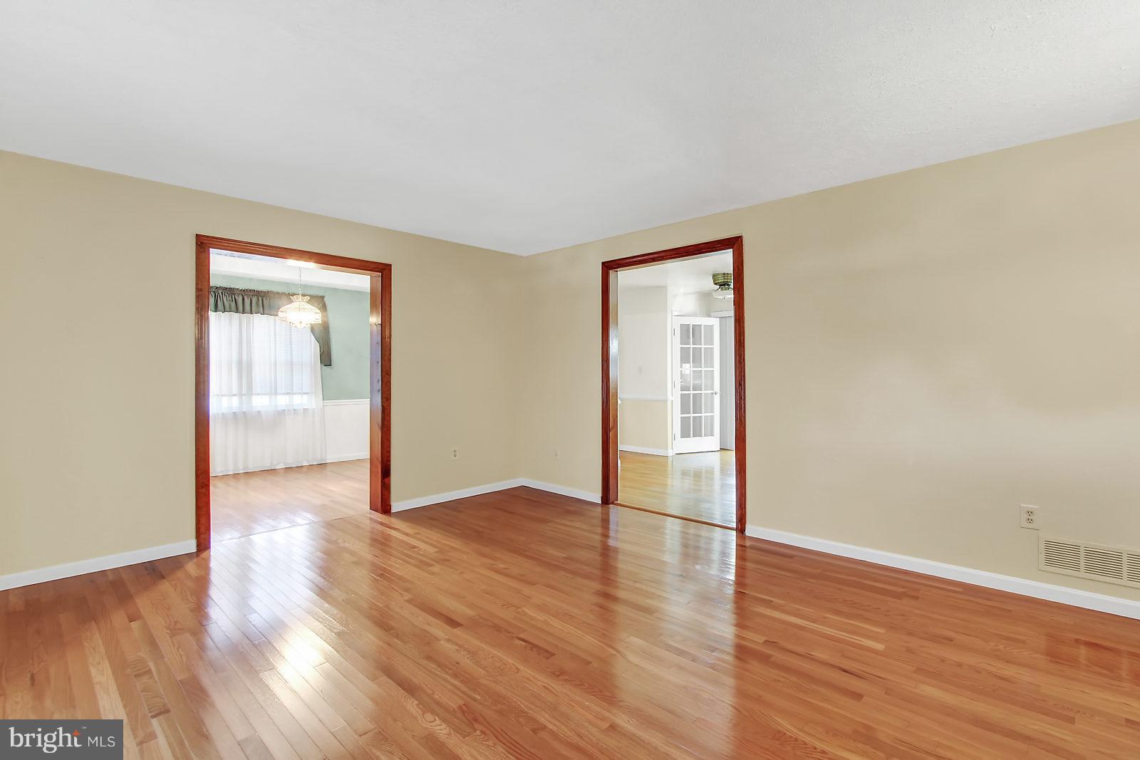 7846 North Cove Road Baltimore, MD 21219 - Photo 3 of 30 Living Room with Beautiful Hardwood Floors