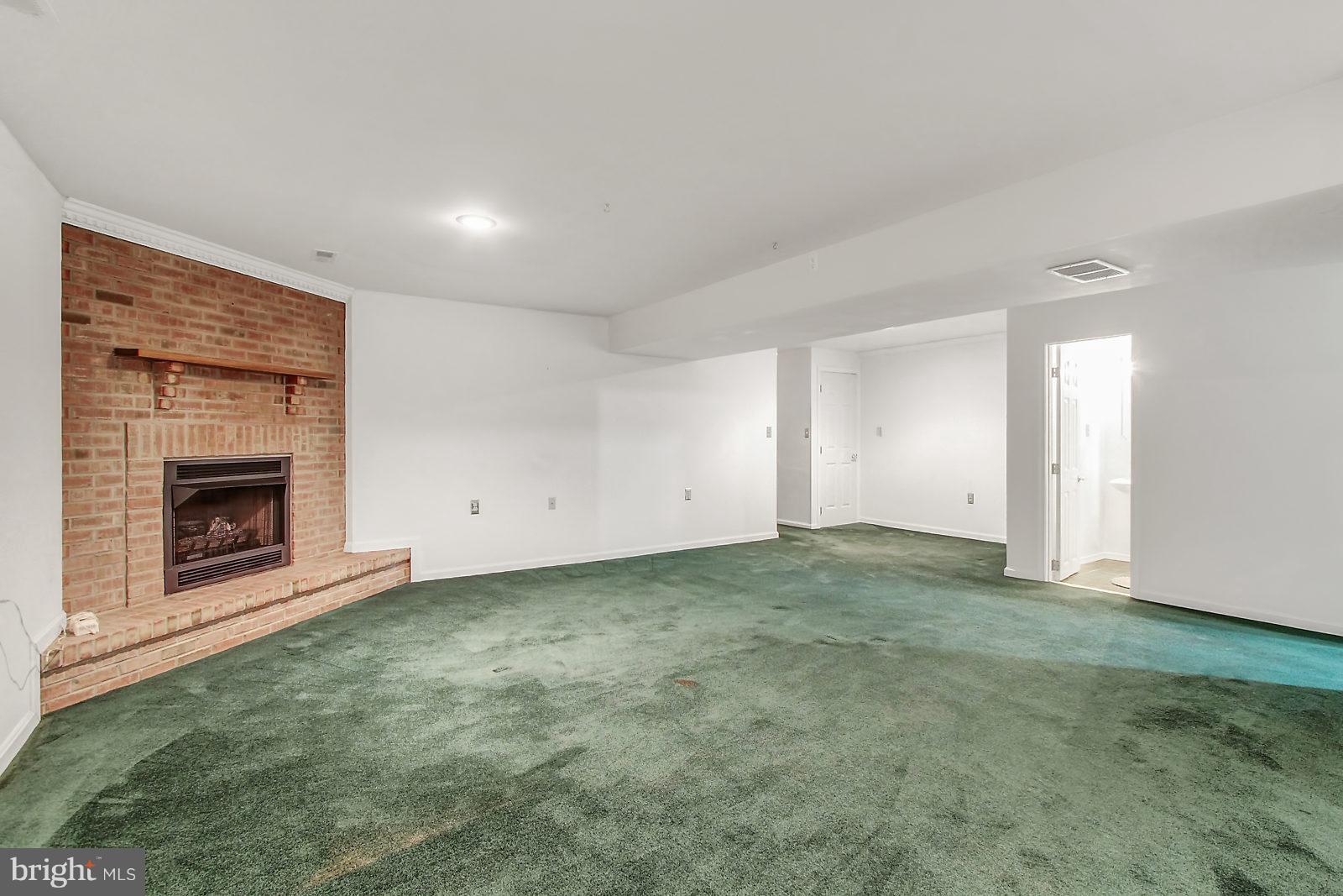 7846 North Cove Road Baltimore, MD 21219 - Photo 25 of 30 Gas Fireplace in Family Room