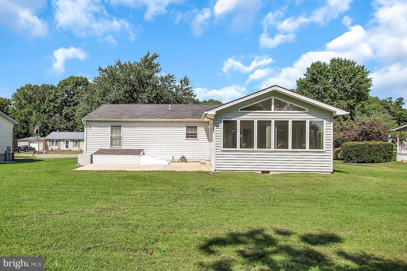 7846 North Cove Road Baltimore, MD 21219 - Photo 29 of 30 Concrete Patio off of Sunroom