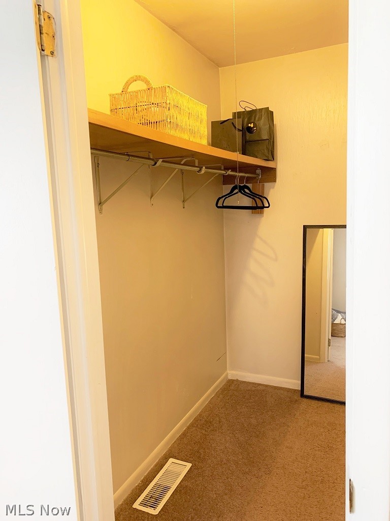 2480 Raber Road, Unit 6D Uniontown, OH 44685 - Photo 15 of 24 Walk-in closet in bedroom 1