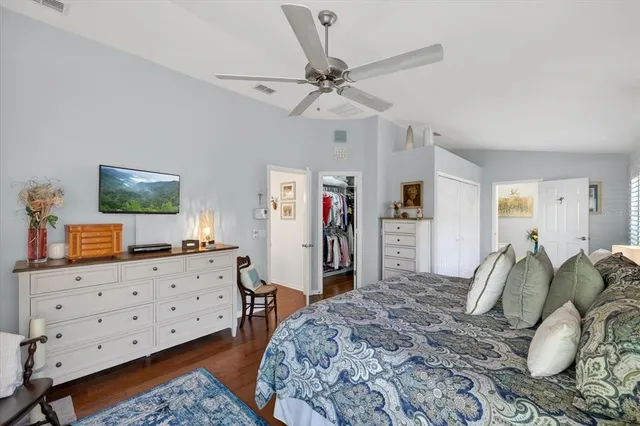 a living room with fireplace furniture and a large window