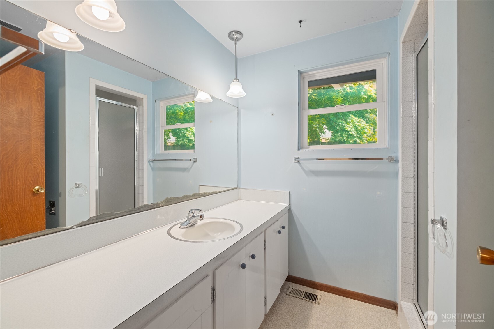 21316 Rolling Ridge Drive Sedro-Woolley, WA 98284 - Photo 19 of 37 a bathroom with a sink and a mirror