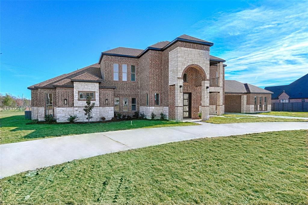 3610 Jack's Loop Midlothian, TX 76065 - Photo 3 of 7 a front view of a house with garden