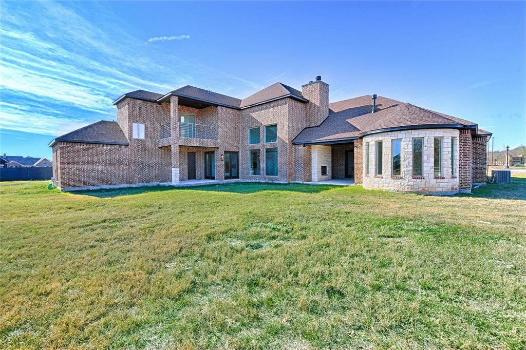 3610 Jack's Loop Midlothian, TX 76065 - Photo 4 of 7 a front view of a house with a yard