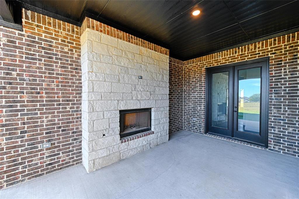 3610 Jack's Loop Midlothian, TX 76065 - Photo 5 of 7 a view of empty room with a fireplace