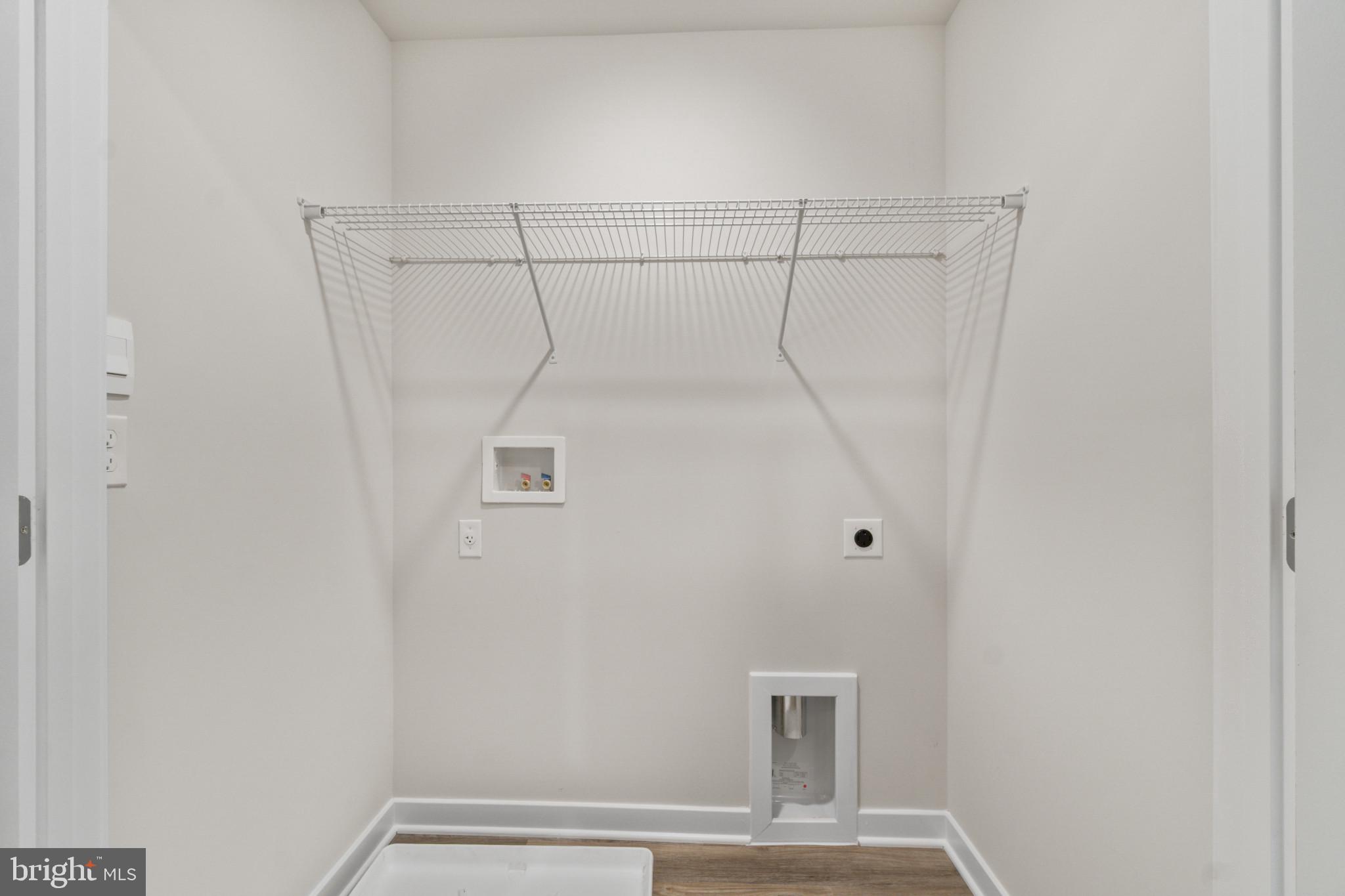 7510 Fern Gully Way Brandywine, MD 20613 - Photo 19 of 31 a view of small space with empty racks on the wall