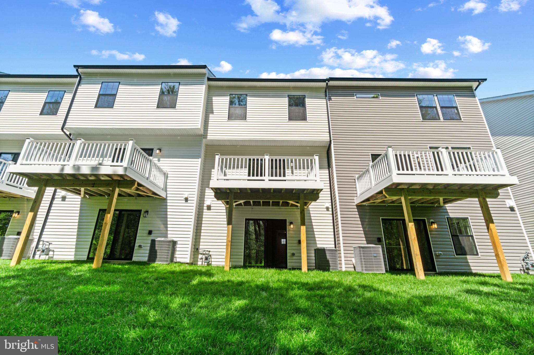 7510 Fern Gully Way Brandywine, MD 20613 - Photo 29 of 31 a front view of a house with a yard