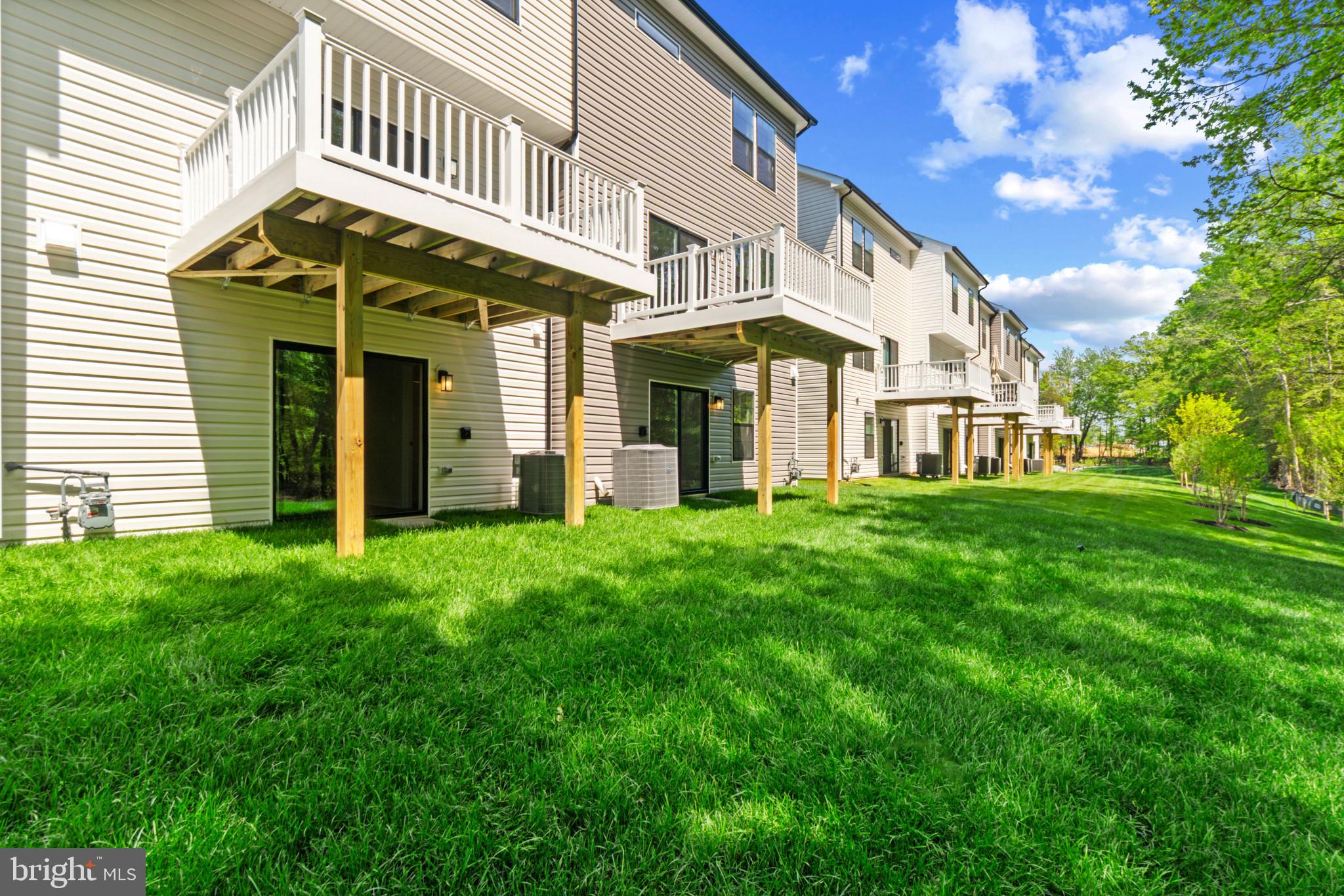 7510 Fern Gully Way Brandywine, MD 20613 - Photo 30 of 31 a view of a house with a yard