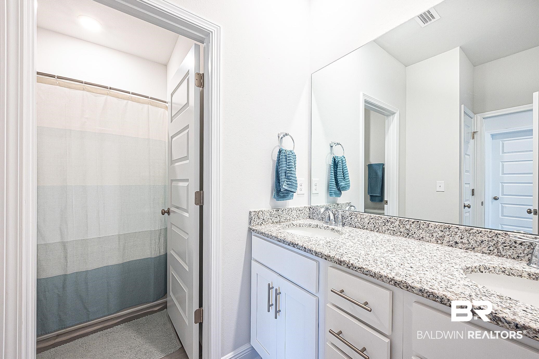 11044 Native Dancer Way Daphne, AL 36526 - Photo 29 of 67 Bathroom featuring dual vanity