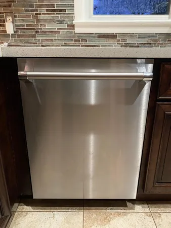 a view of a refrigerator in a kitchen